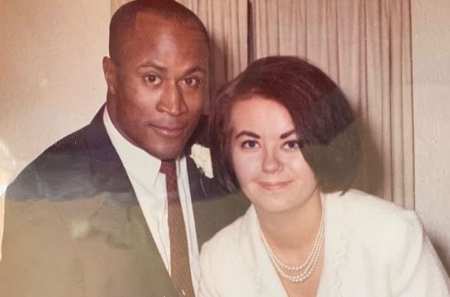  Noel J. Mickelson with her former husband, John Amos posing for a photo shoot.